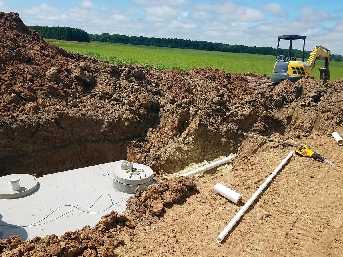 Large hole excavated for a double chamber septic tank
