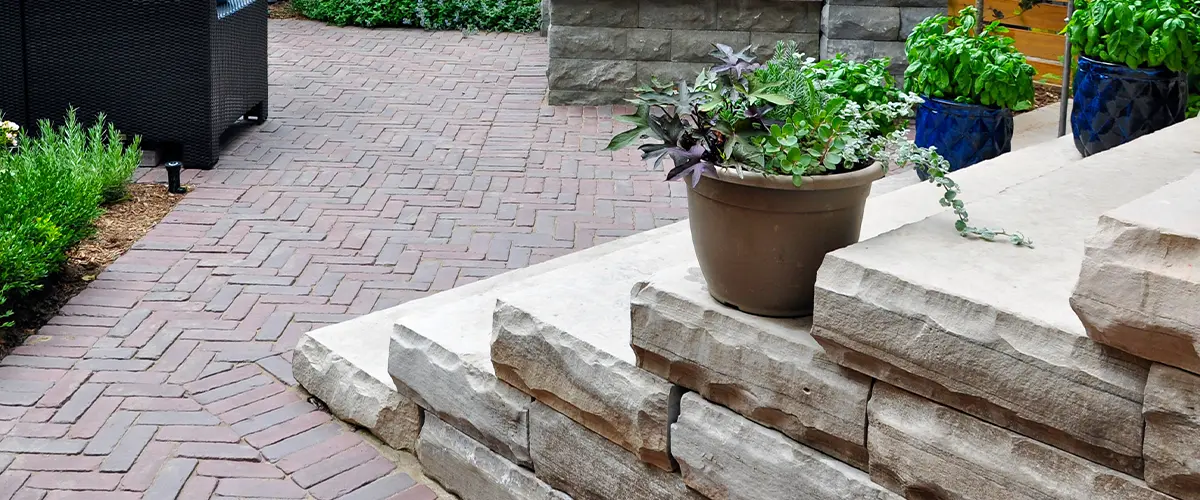 Bricks and pavers on patio and stairs in xeriscaping project
