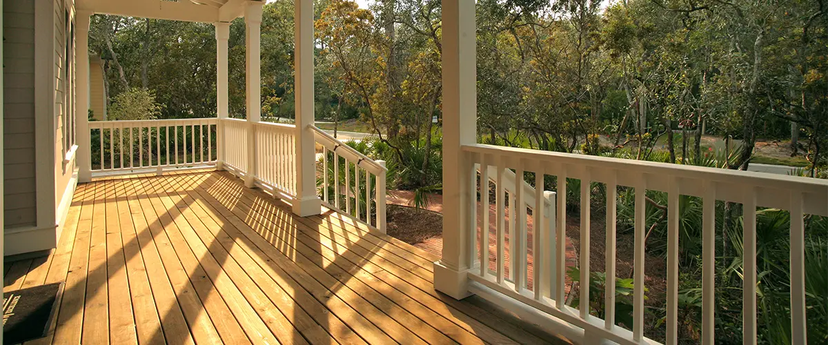A wood deck in a backyard