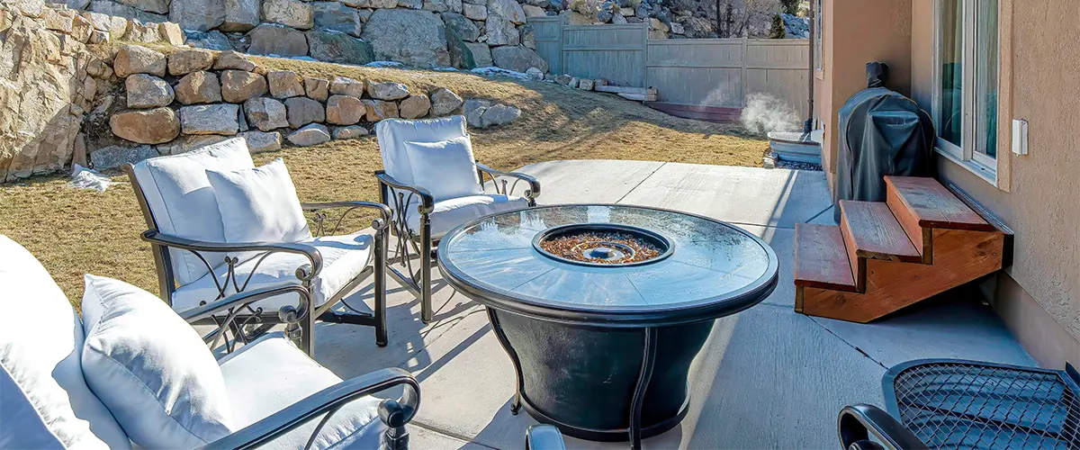 Outdoor furniture with a glass fireplace
